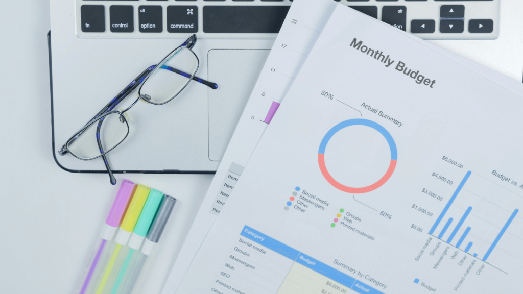 financial charts on desk